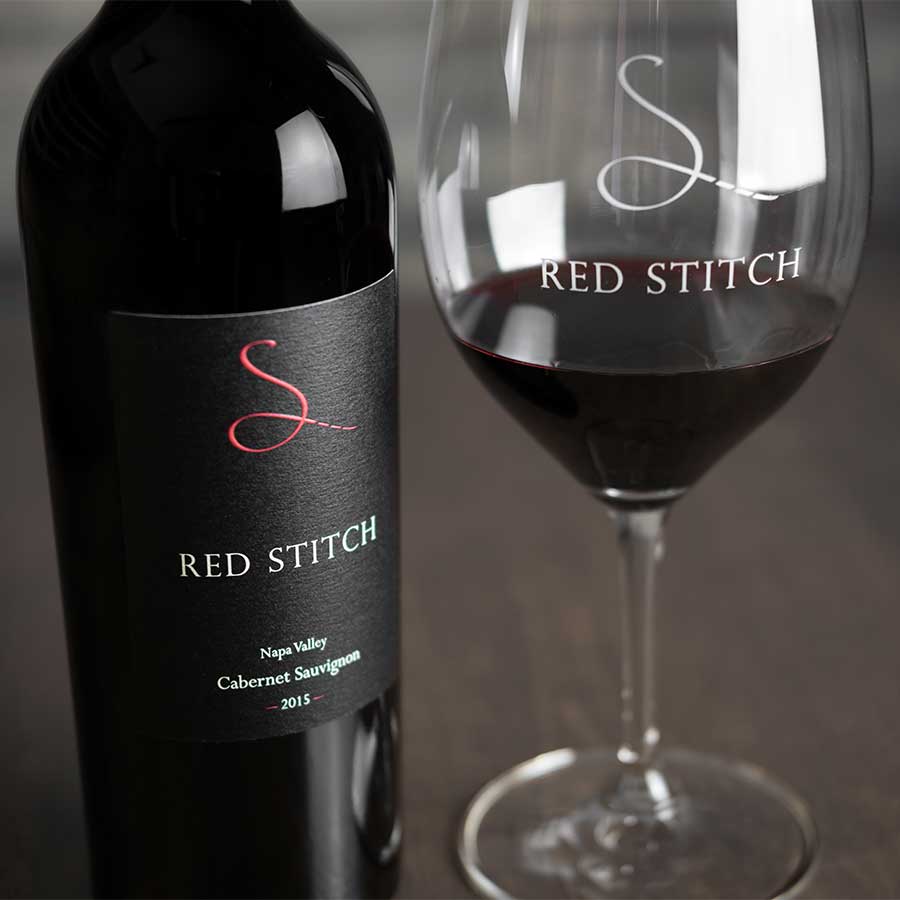 Red Stitch Cabernet Sauvignon wine bottle and glass, Napa Valley, 2015.